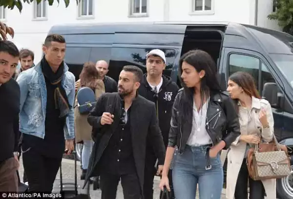 Cristiano Ronaldo and girlfriend mobbed by fans as they visit his CR7 hotel (Photos)